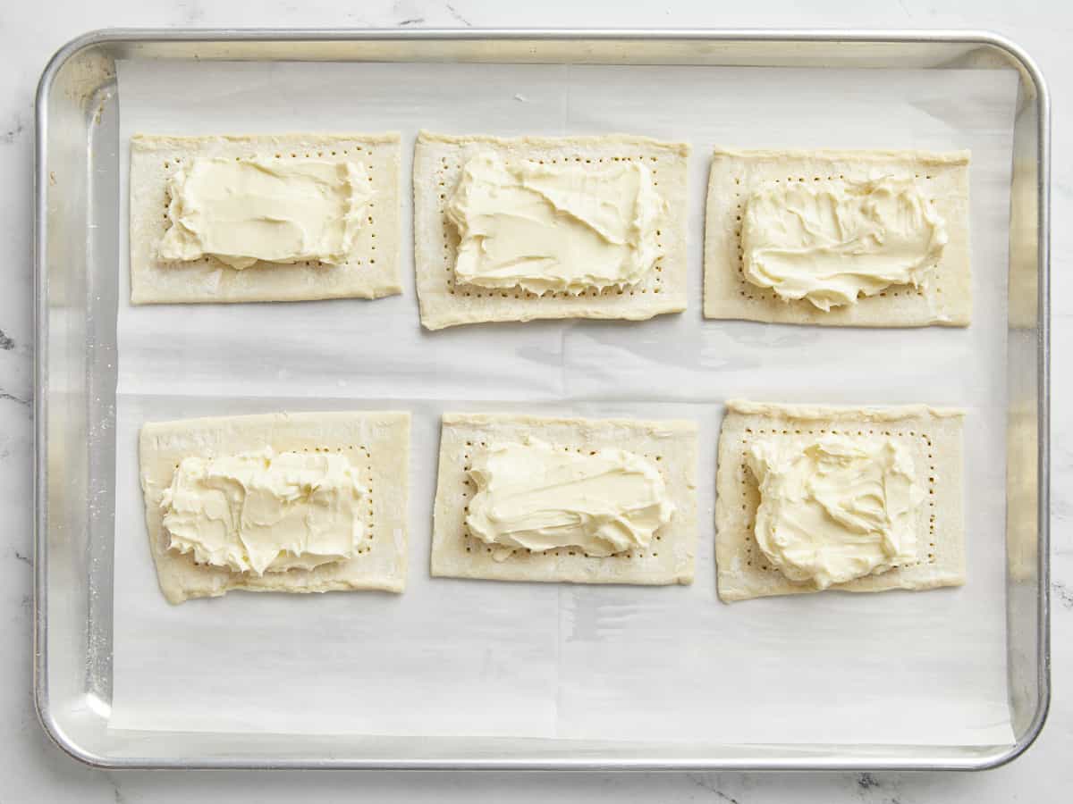 Overhead shot of of filling added to the puff pastry rectangles.