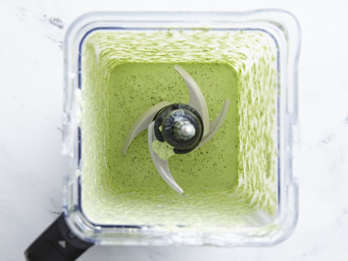 Overhead shot of Green Goddess Dressing in a blender.