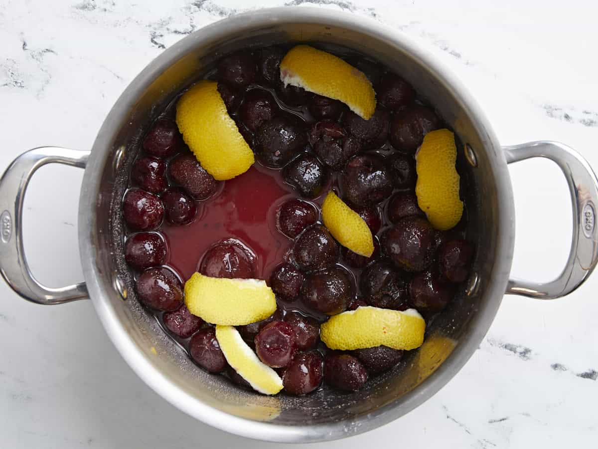 Lemon peels added to the sauce pot. 