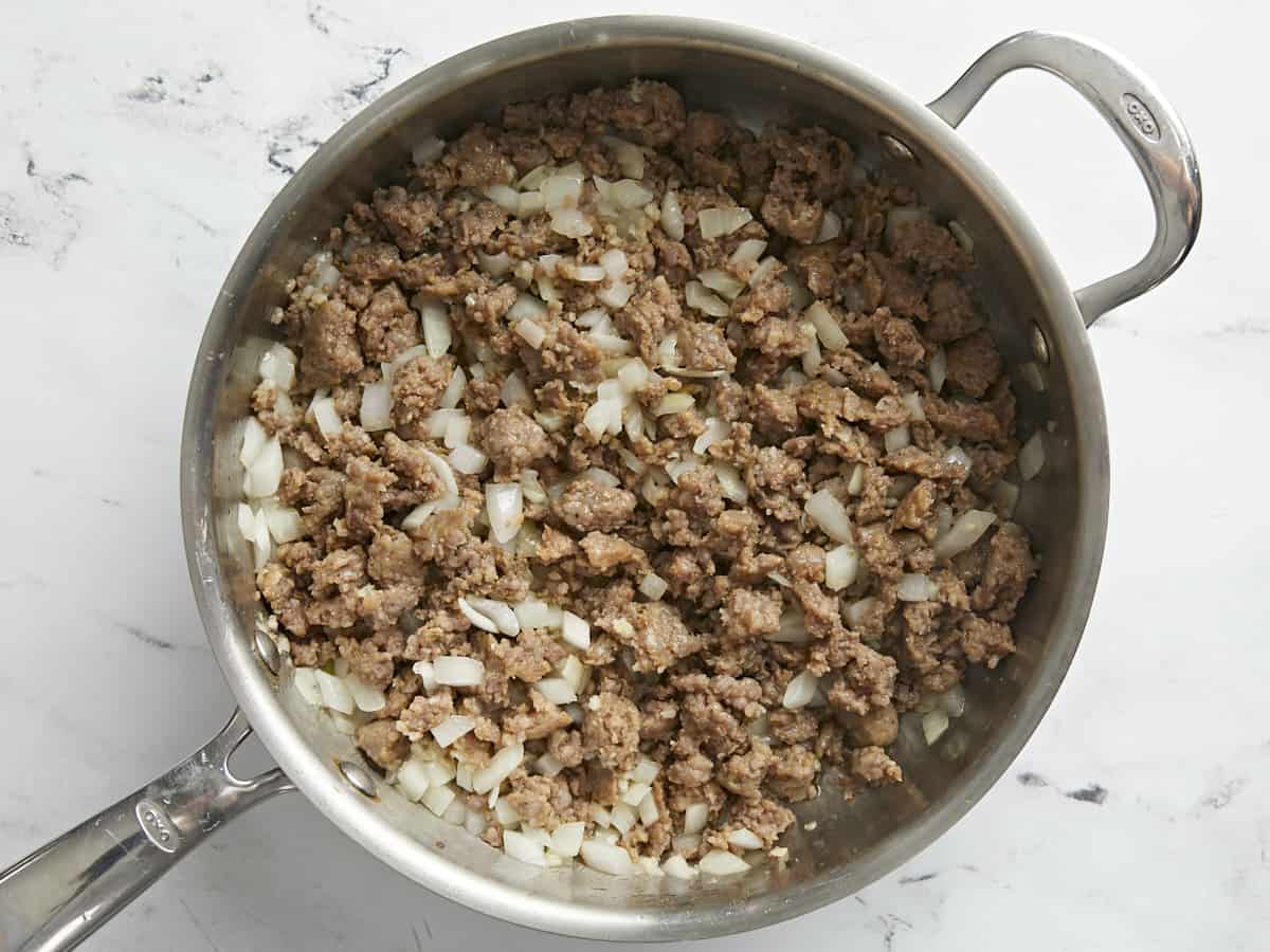 Cooked Italian sausage with onions and garlic.