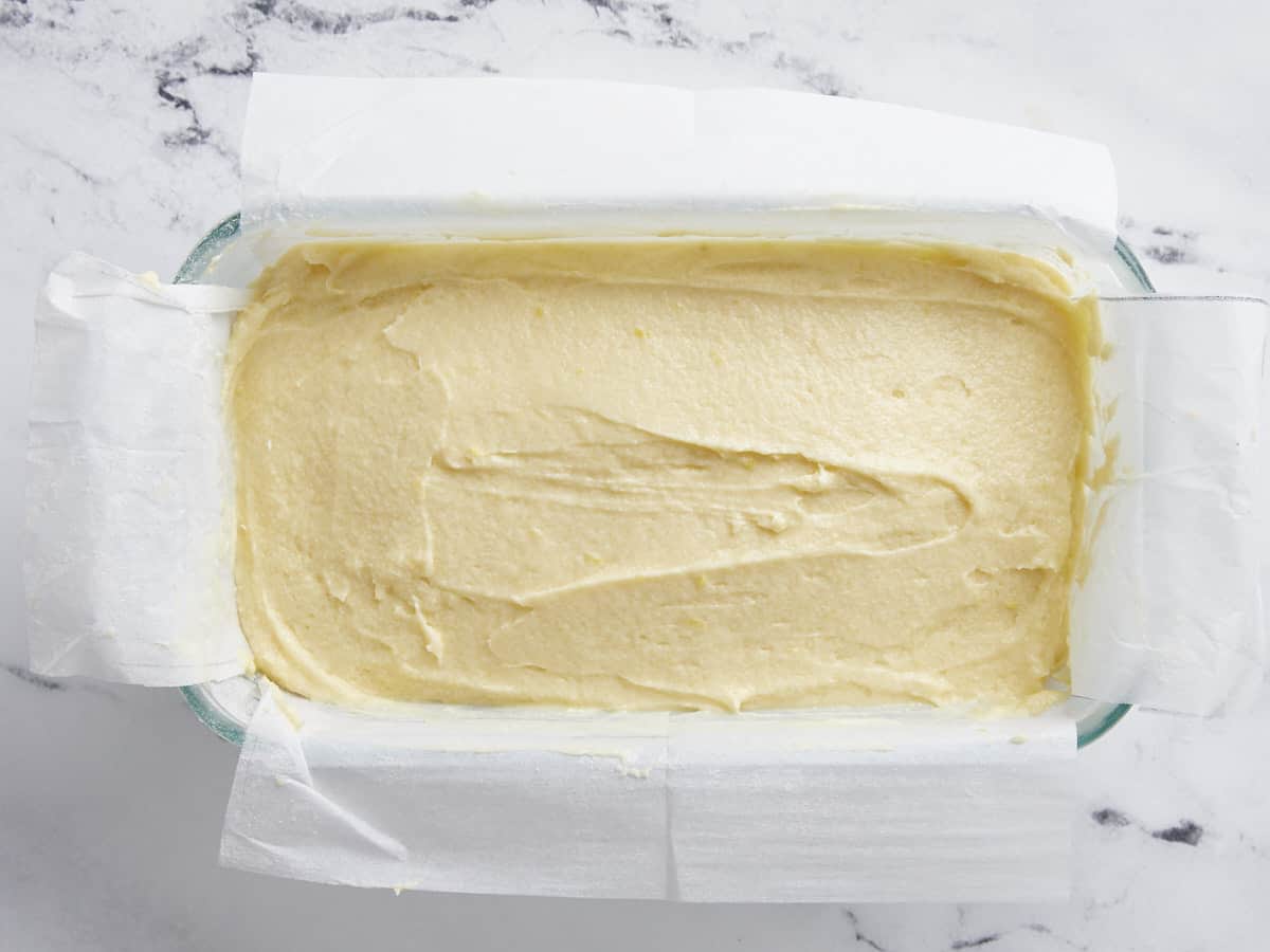 Lemon pound cake batter in the loaf pan ready to be baked.