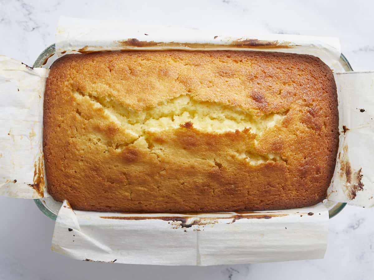 Baked lemon pound cake in the baking pan.