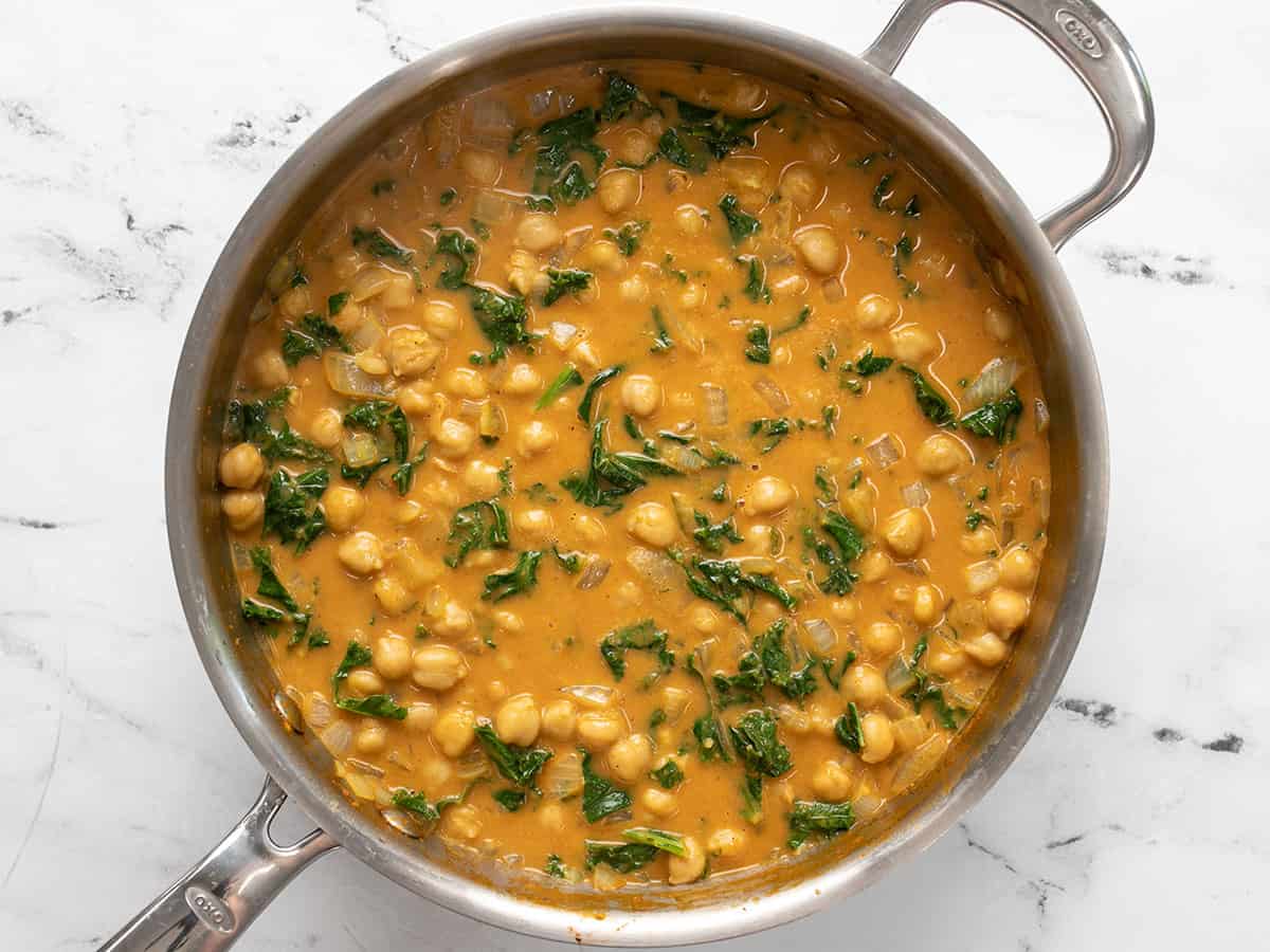 Finished coconut curry chickpeas with wilted kale.