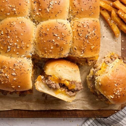 Overhead view of sliders on parchment paper.