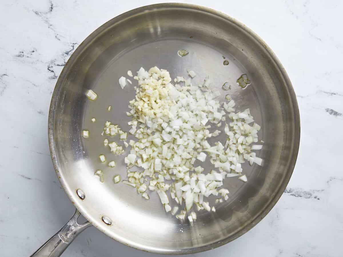 Onion and garlic in a skillet.