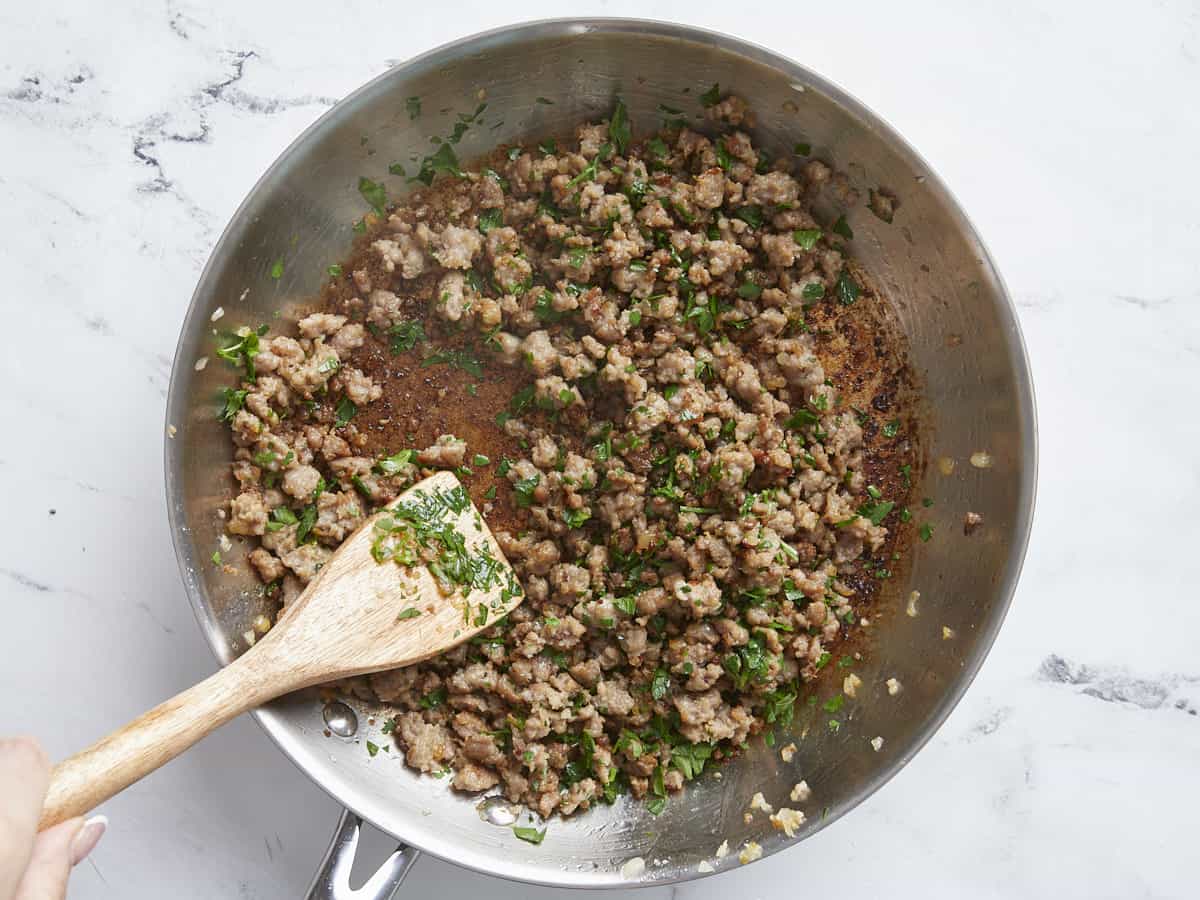 Cooked pork sausage in the skillet.