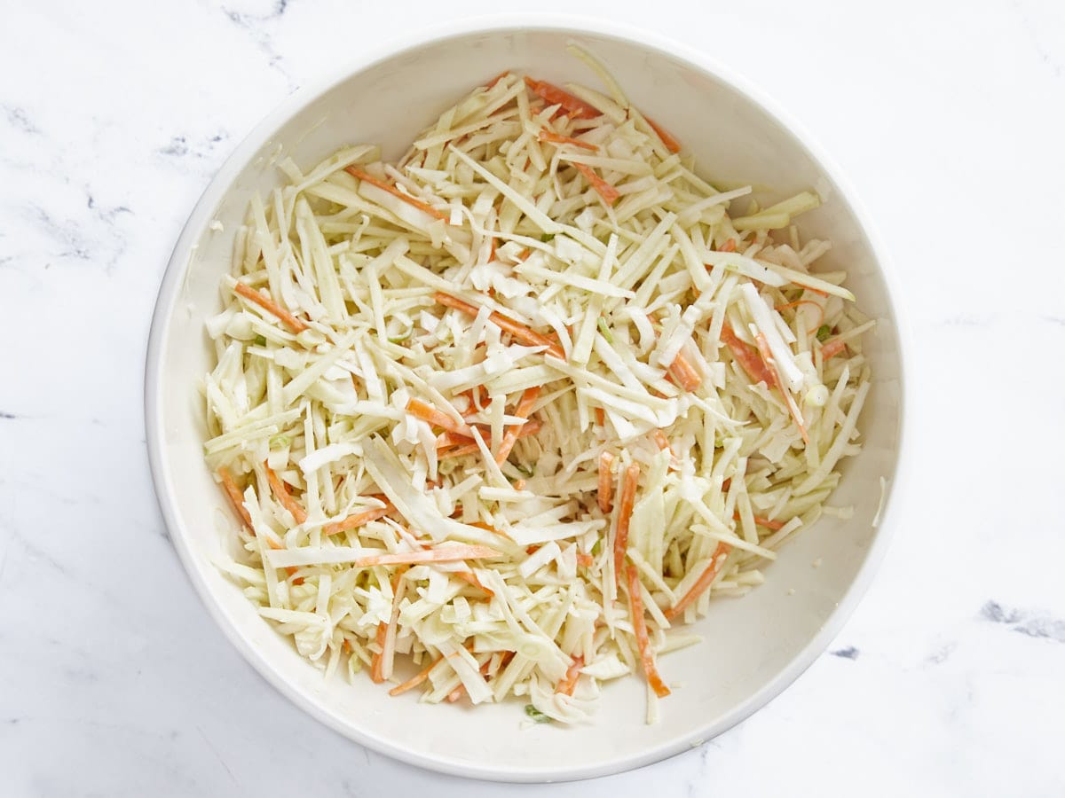 Finished apple slaw in a bowl.