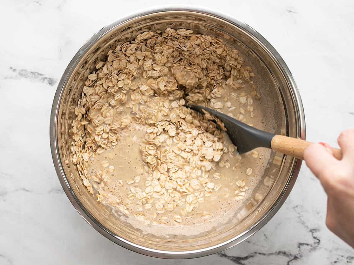 Dry oats stirred into the applesauce and milk mixture.