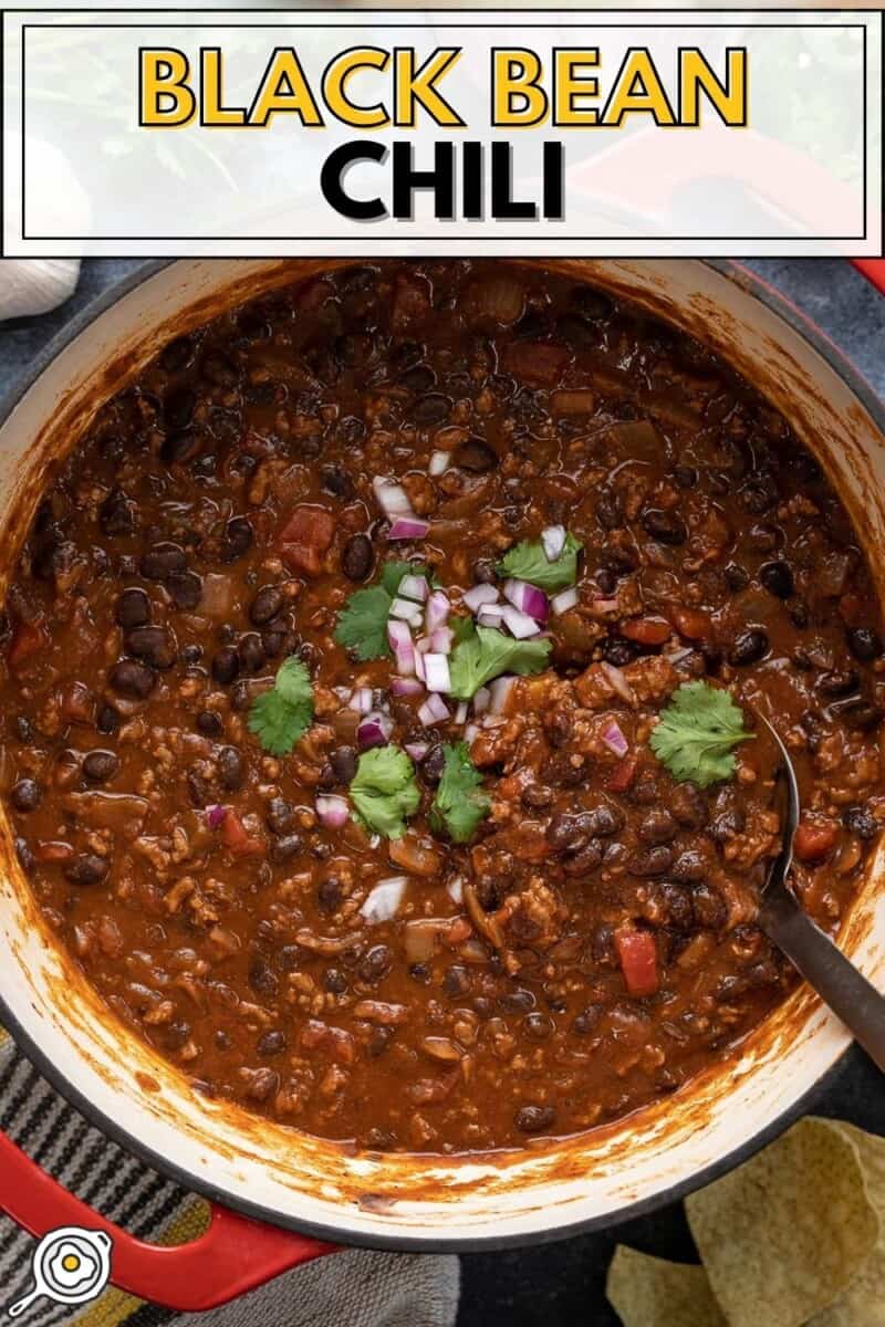 Overhead view of a pot full of black bean chili.