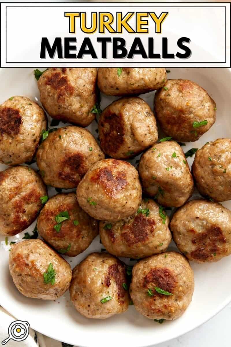 Close up overhead view of a bowl full of turkey meatballs.