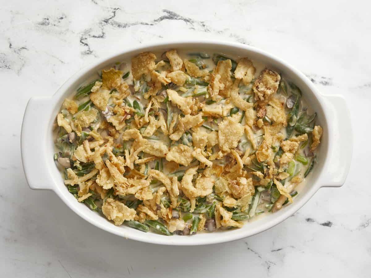 Green bean casserole in transfered to a baking dish. 