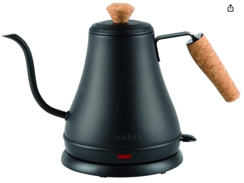 Black gooseneck tea kettle with a cork handle. 