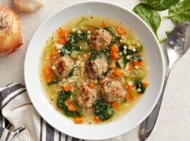 Overhead view of a bowl full of Italian Wedding Soup.