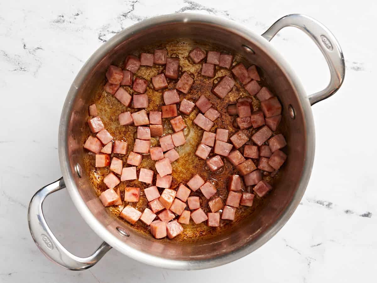 Diced ham browned in the pot.