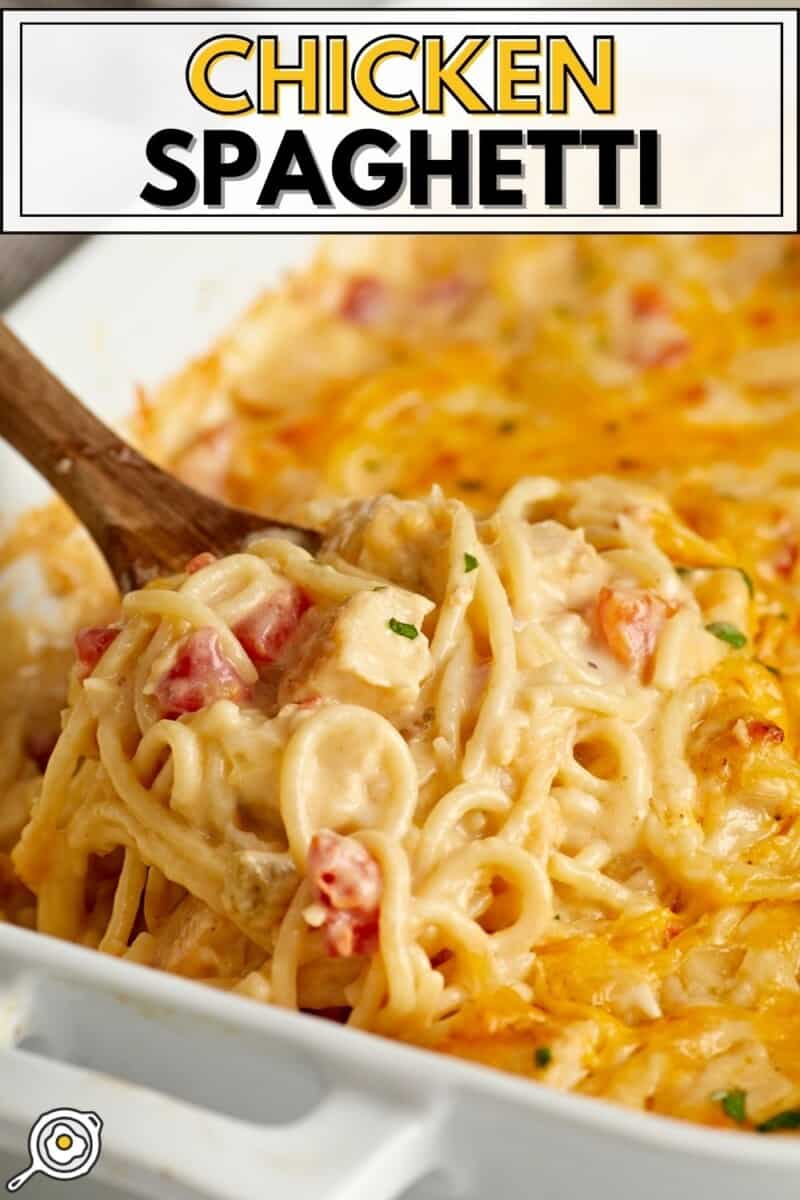 Side close up view of chicken spaghetti in a casserole dish with a wooden spoon lifting some out and title text at the top.