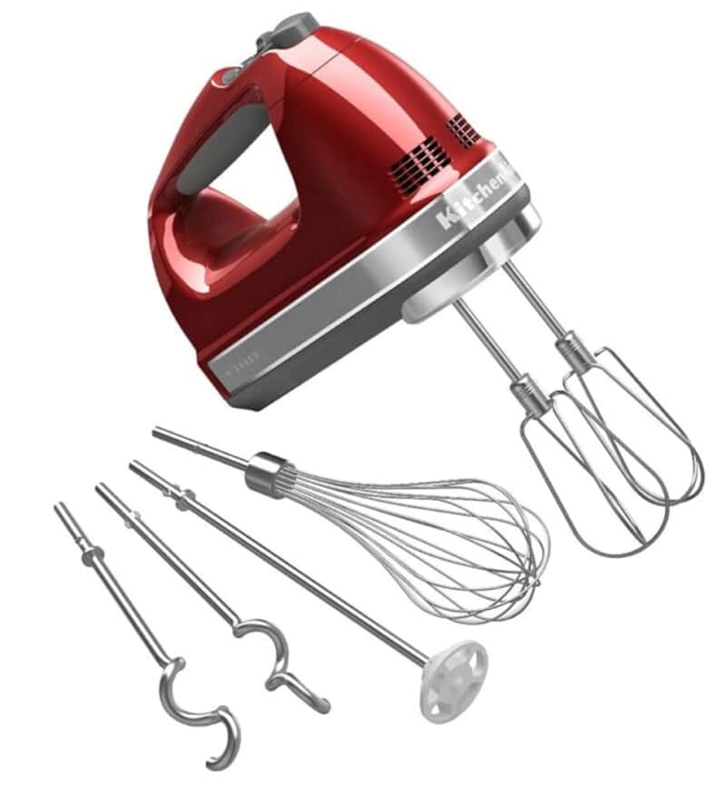 Red Kitchen Aide hand mixer with attachments. 