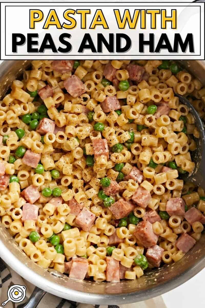 Close up overhead view of pasta with peas and ham in a pot, title text at the top.