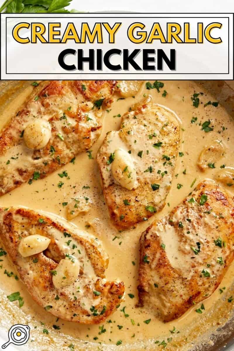 Overhead view of Creamy Garlic Chicken in a skillet with title text at the top.