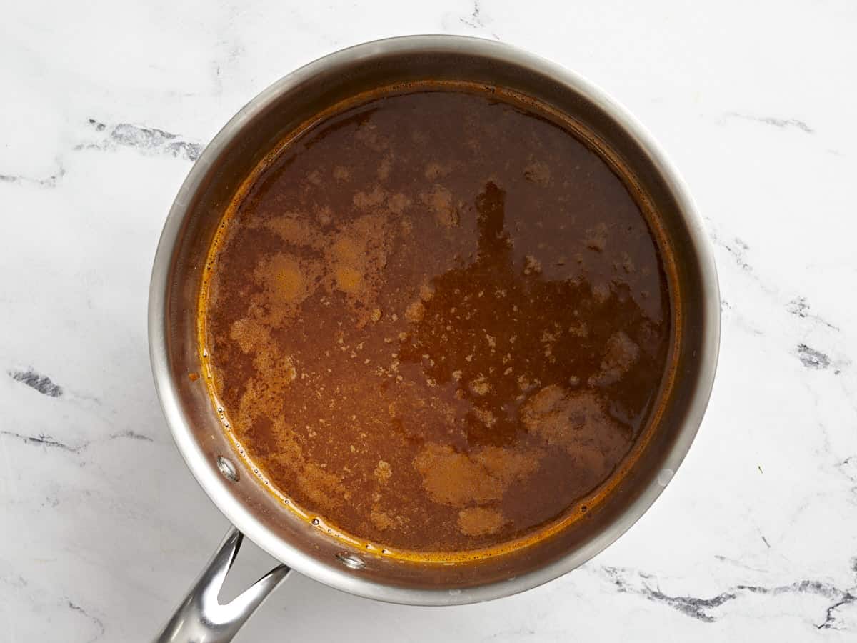 orange liquid in a saucepan.