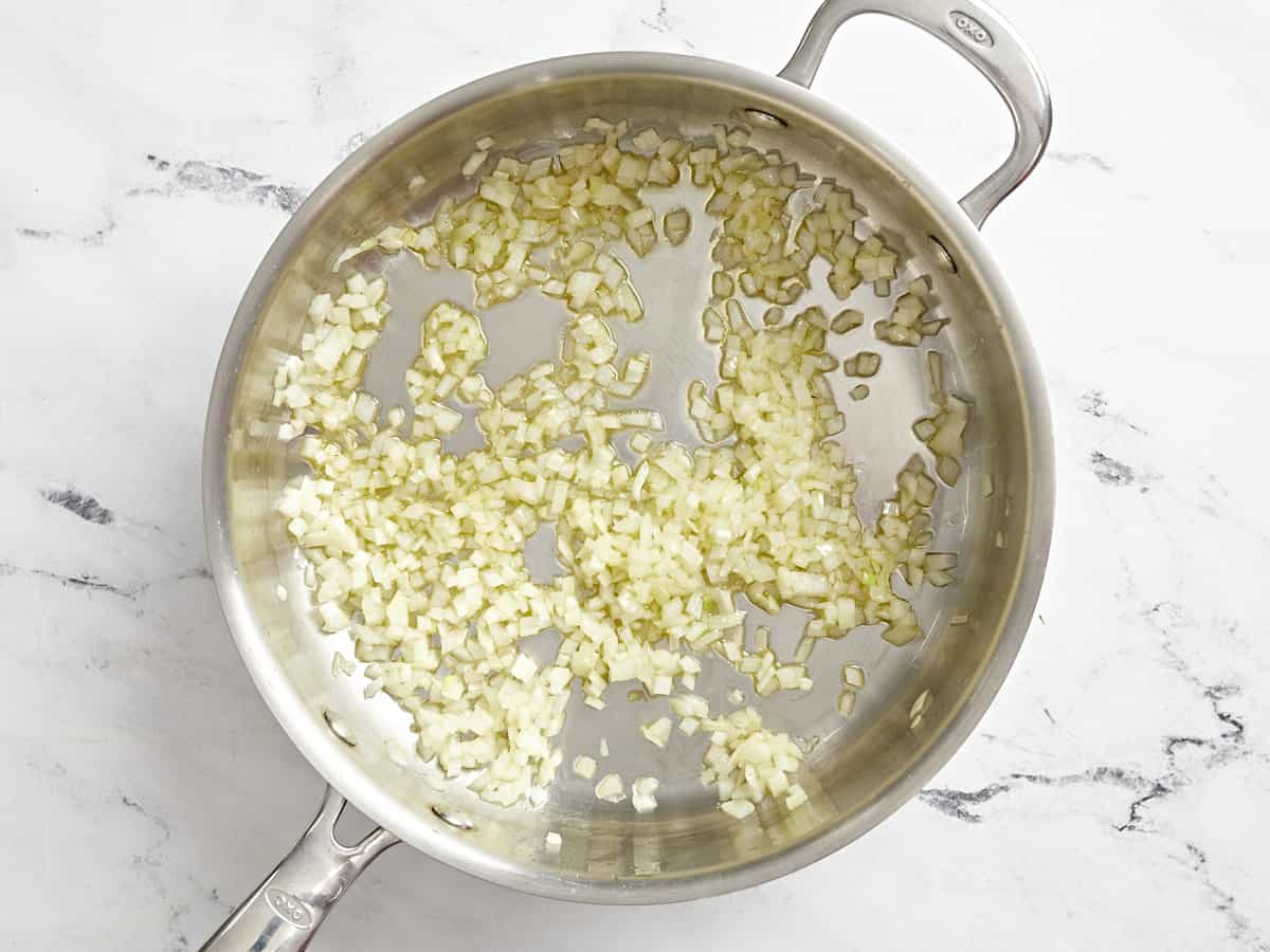 diced onion in a pan.