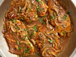 overhead view of chicken marsala in a pan.