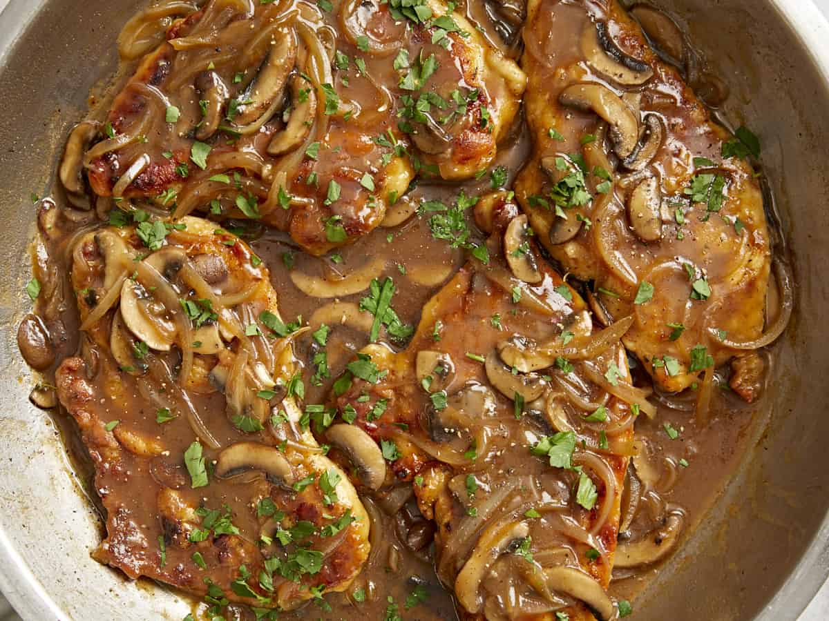 overhead view of chicken marsala in a pan.