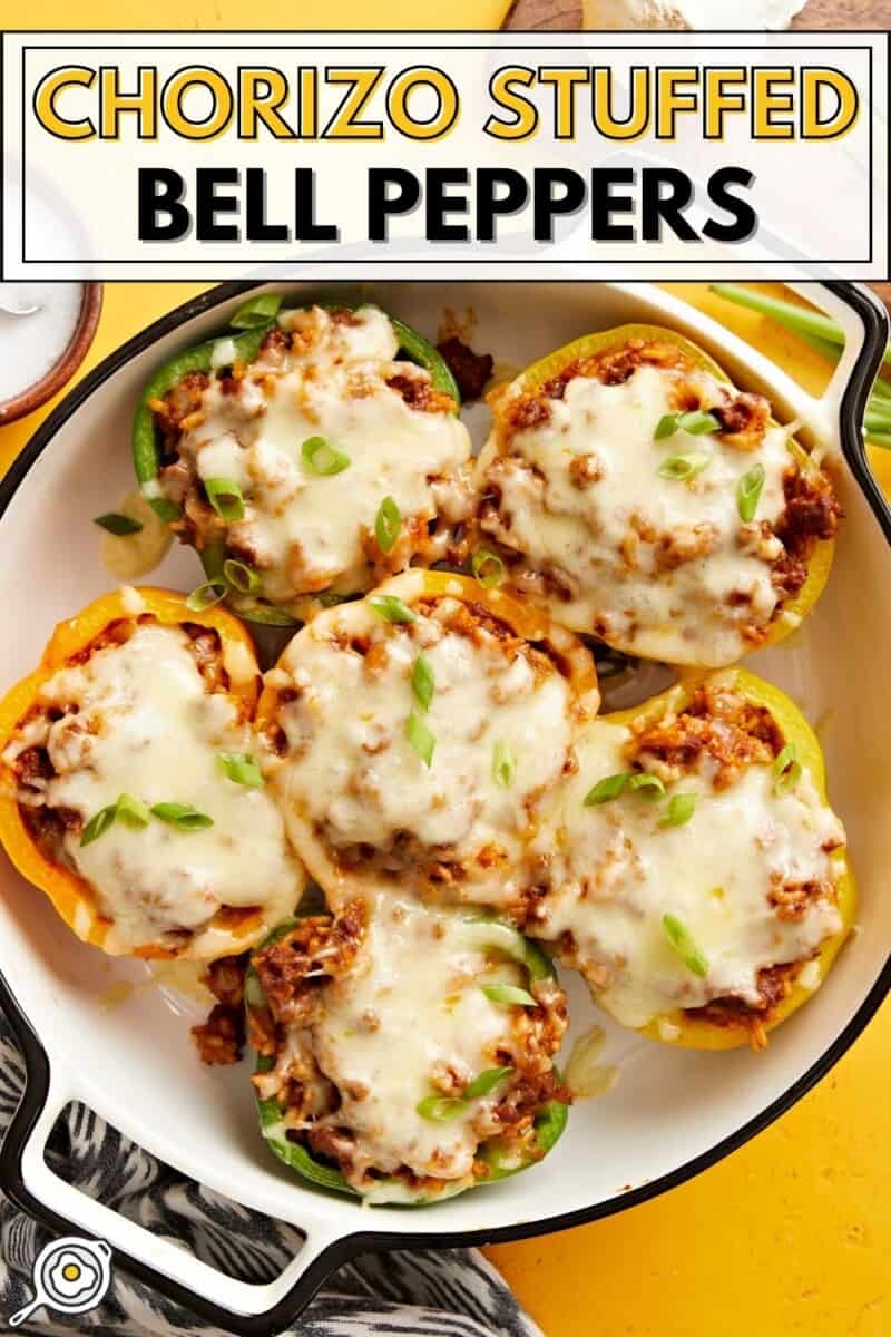 Overhead view of chorizo stuffed bell peppers in a round baking dish.