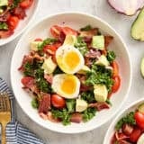 Overhead view of a blt avocado brunch salad bowl.