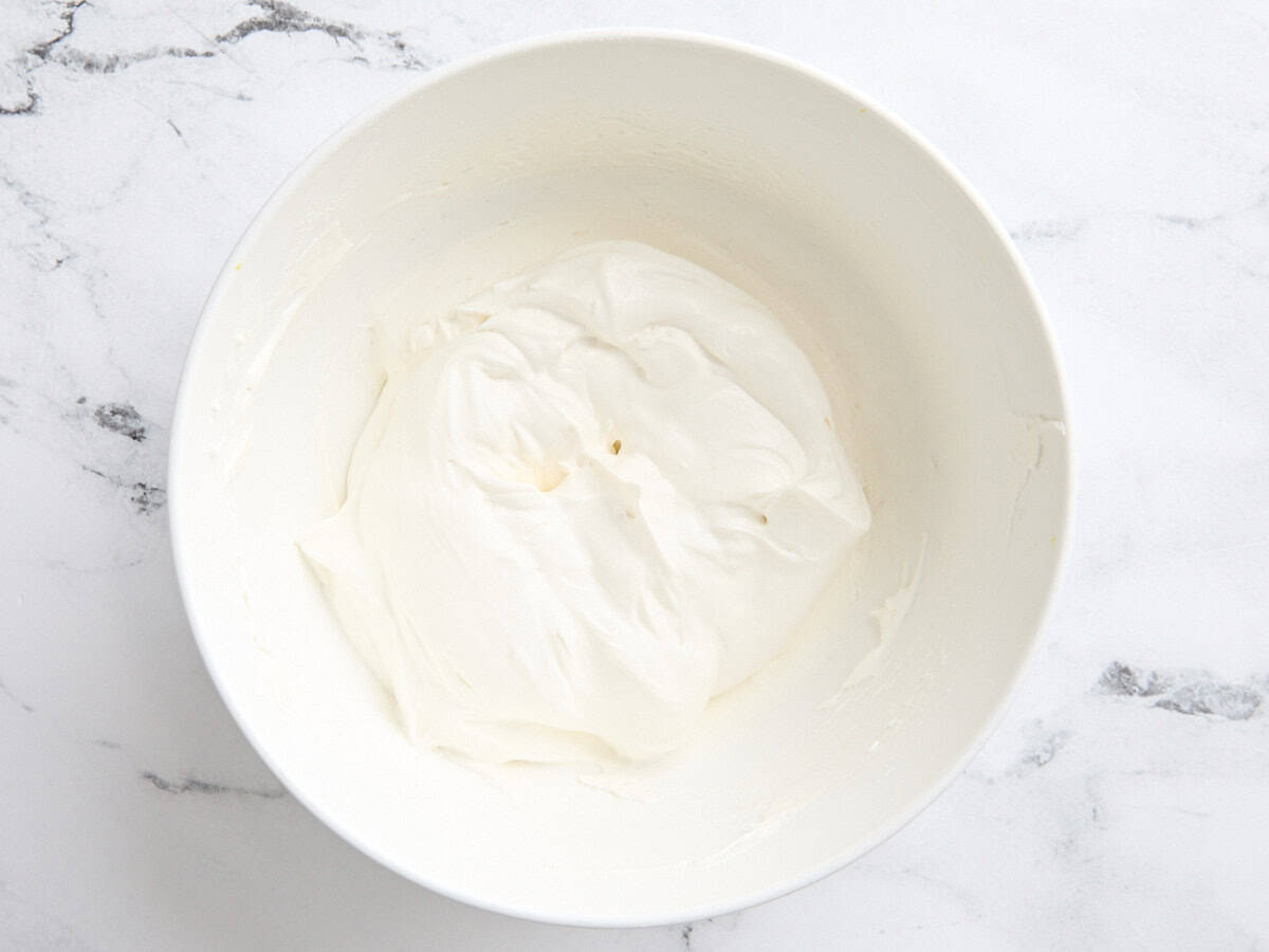 Finished fruit dip in a mixing bowl.