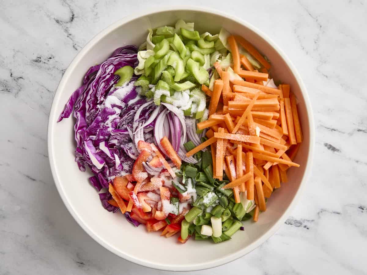 Prepped kimchi veggies in a mixing bowl.