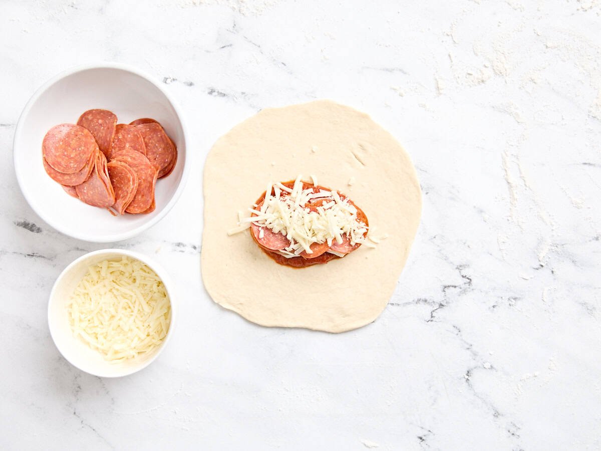 Pepperoni and cheese added to the filling for calzone.