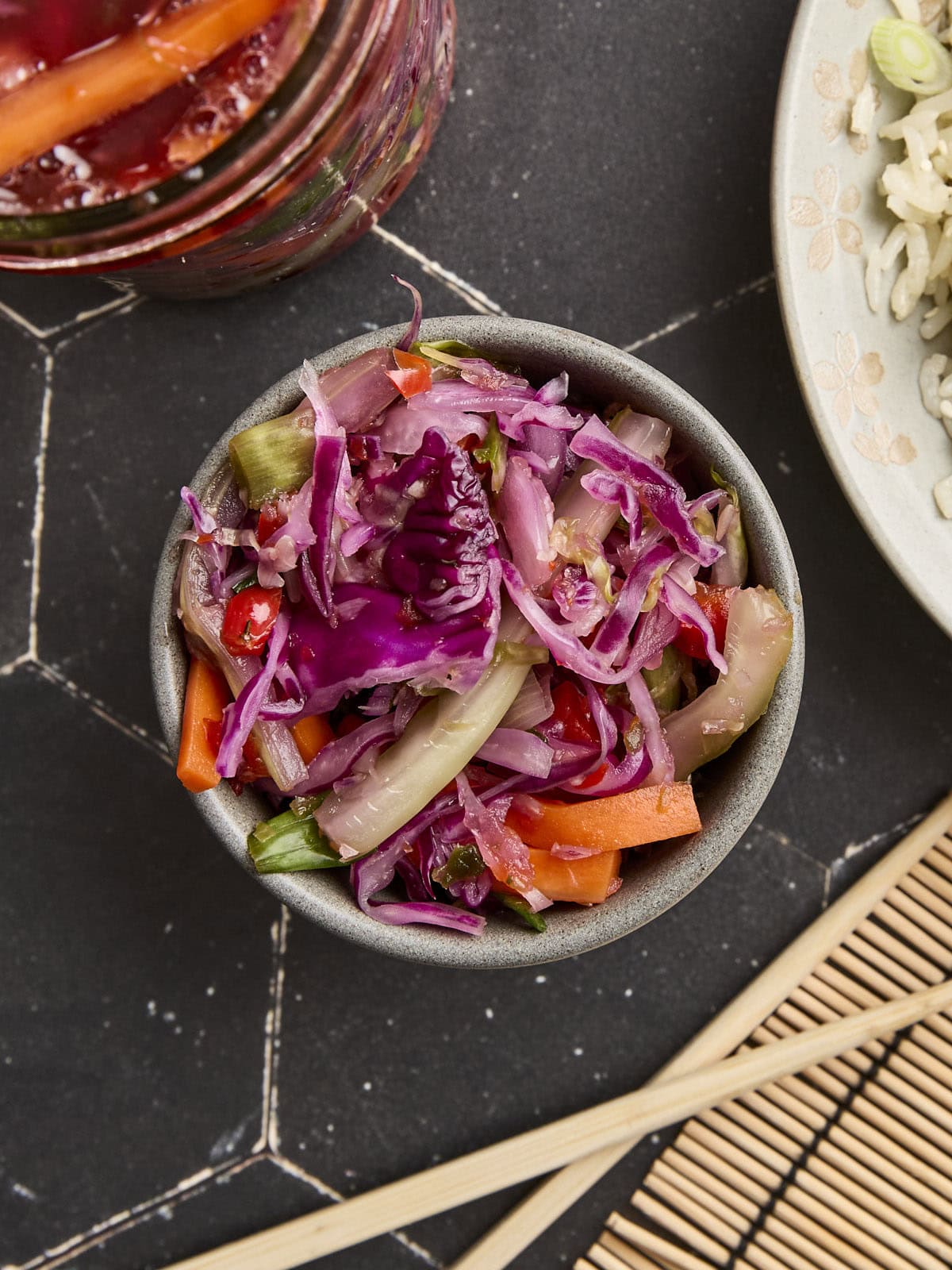 Overhead view of homemade kimchi in a bowl.