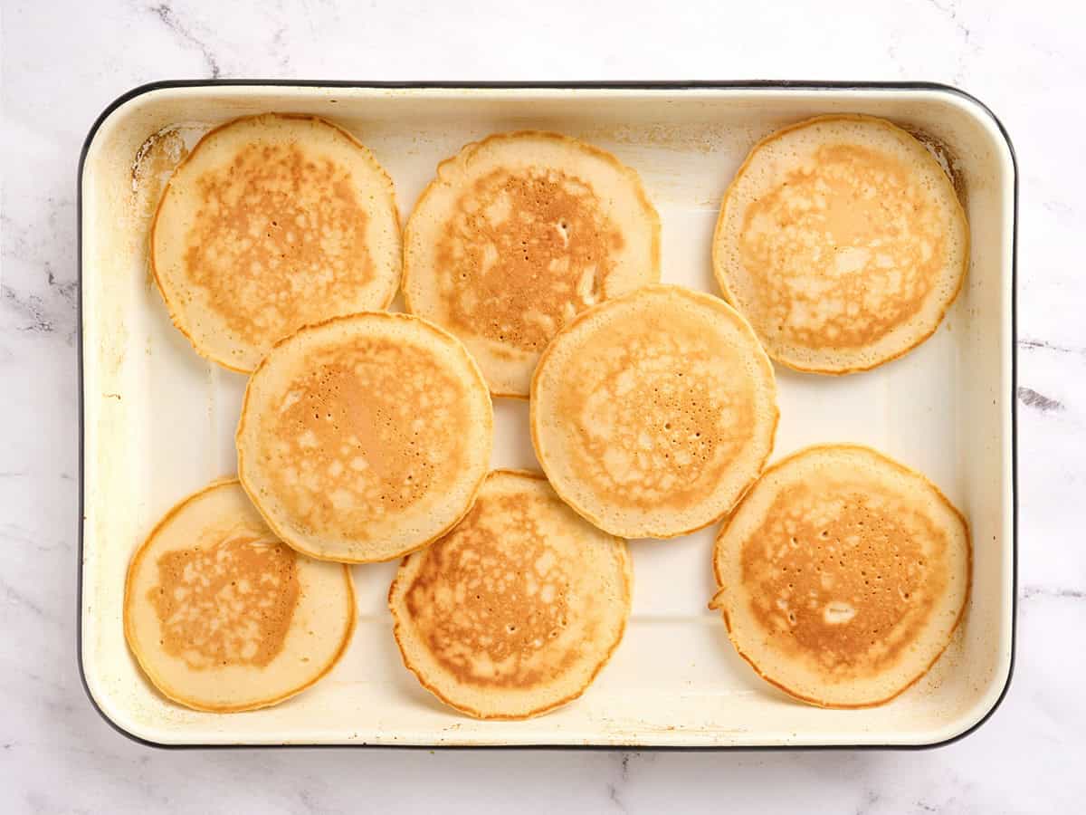 Fluffy homemade pancake on a baking sheet.