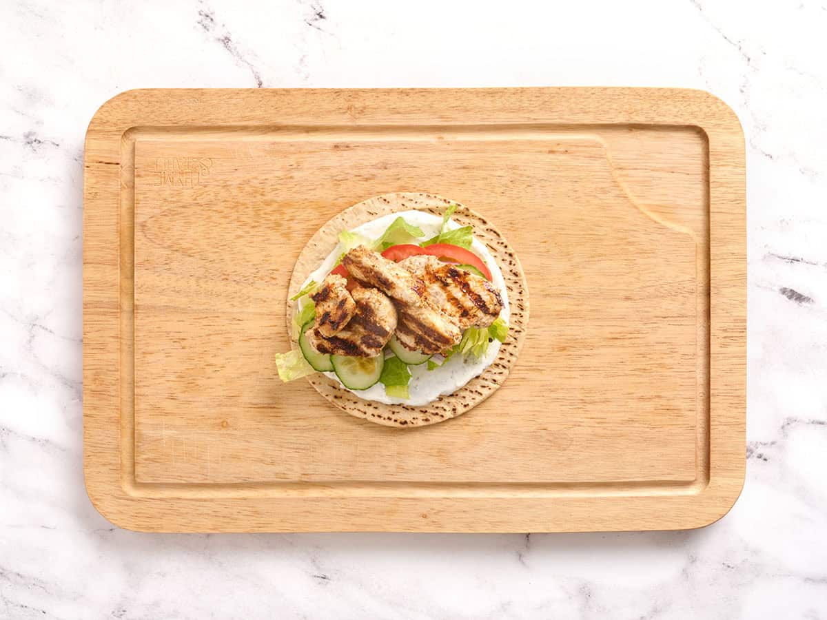 An assembled Chicken Shawarma wrap.