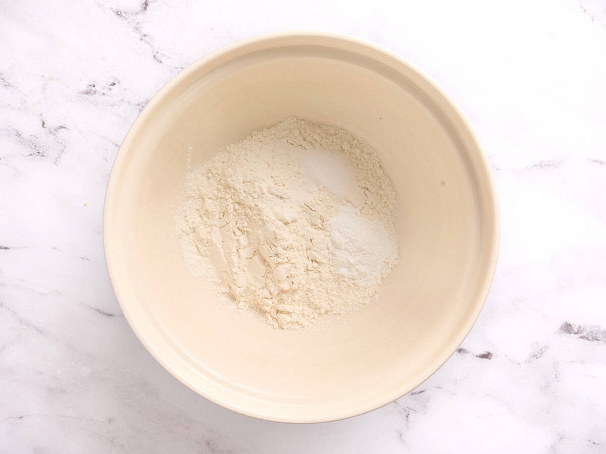 Flour and baking powder in a bowl.