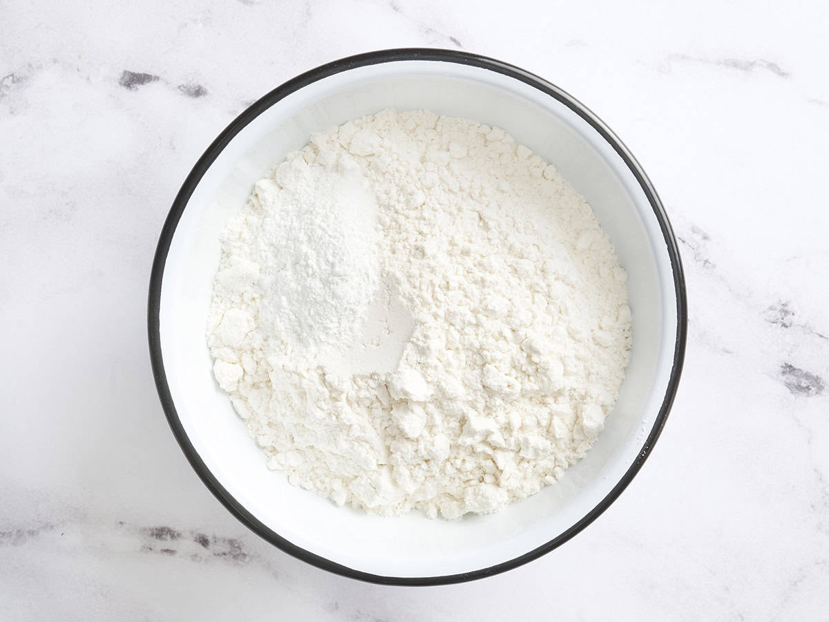 Flour and baking powder in a bowl.