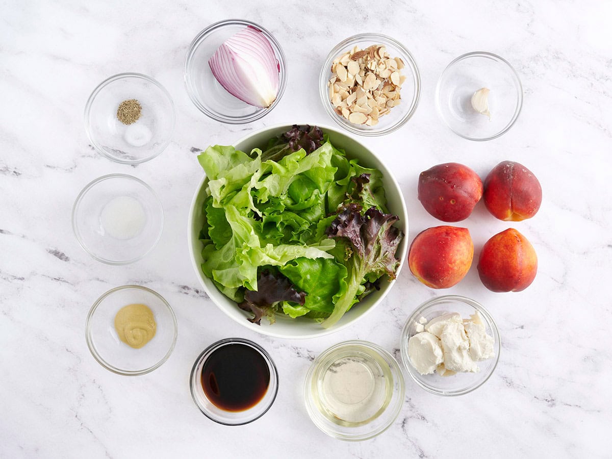 The ingredients for a grilled peach salad.