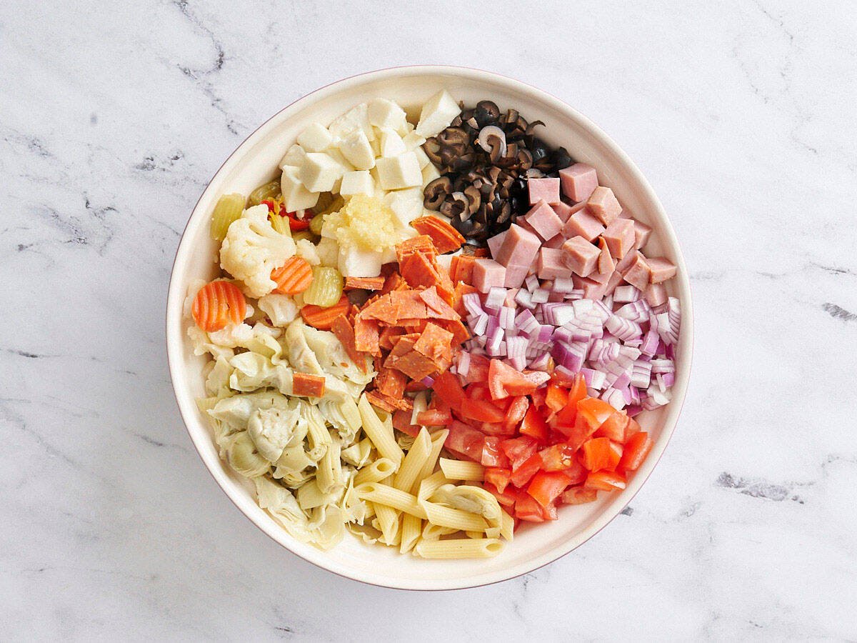 The ingredients for antipasto salad in a bowl.