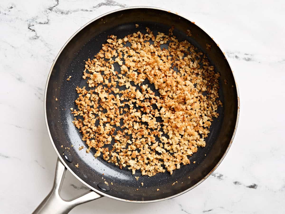 Toasted panko breadcrumbs in a skillet.