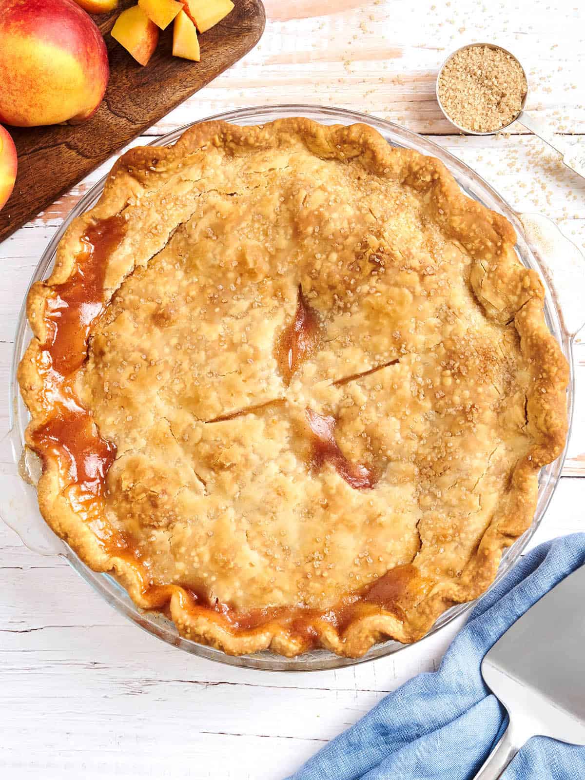 Overhead view of a homemade peach pie.