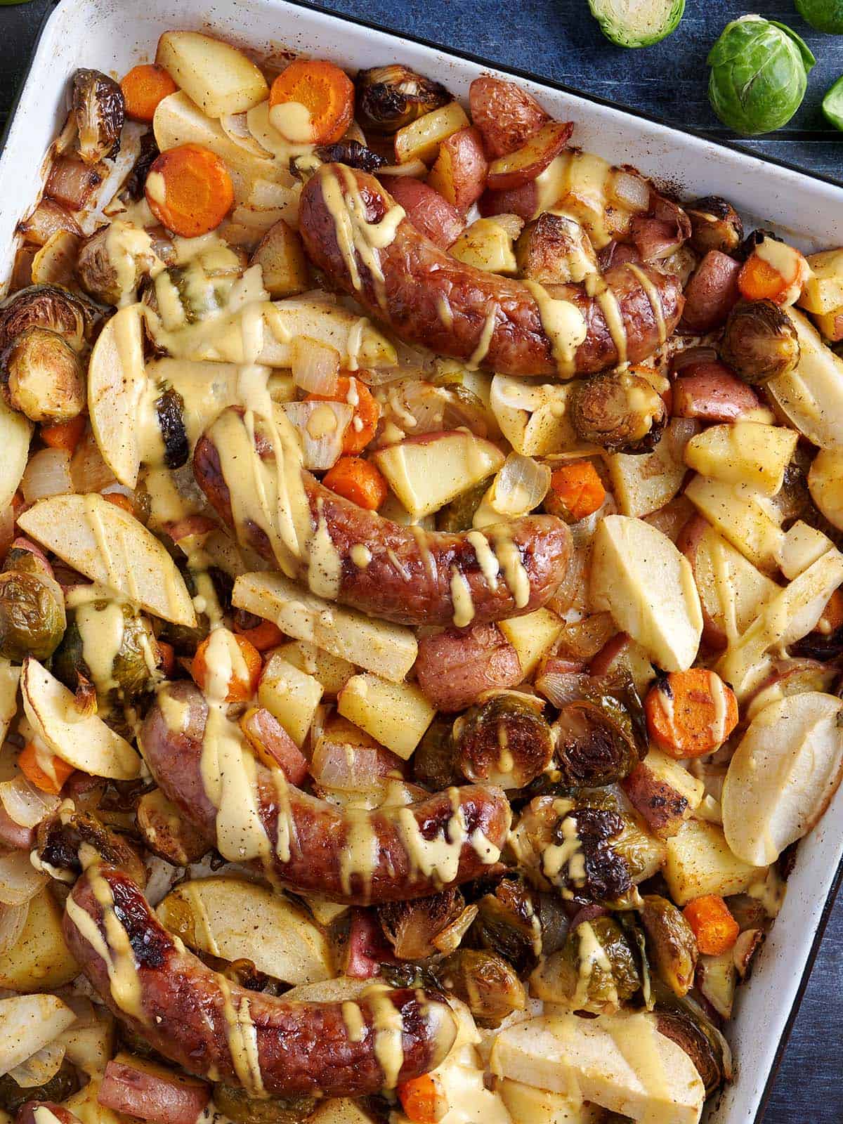 Overhead view of Oktoberfest sheet pan brats.