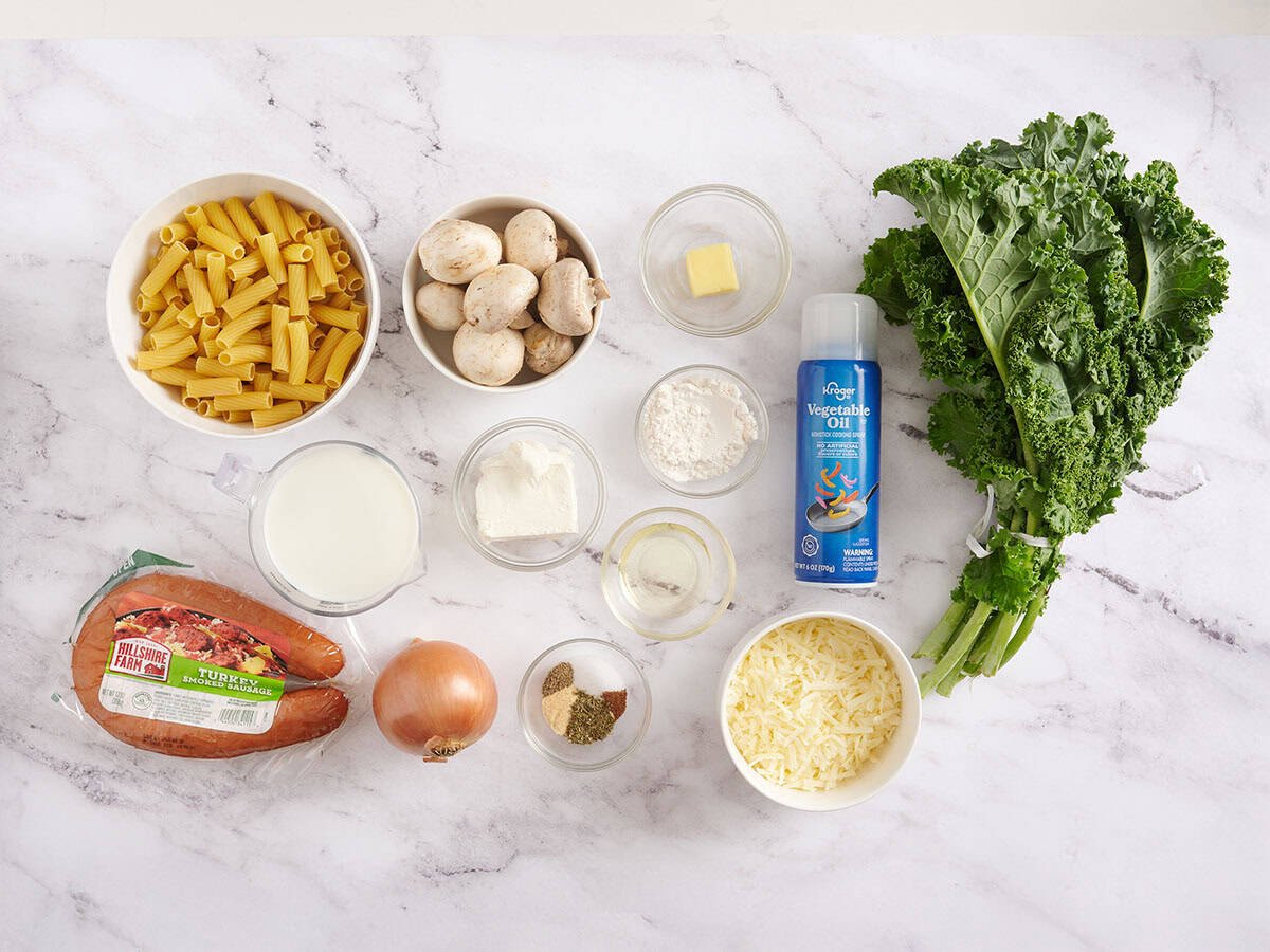 Ingredients to make turkey sausage and kale casserole.