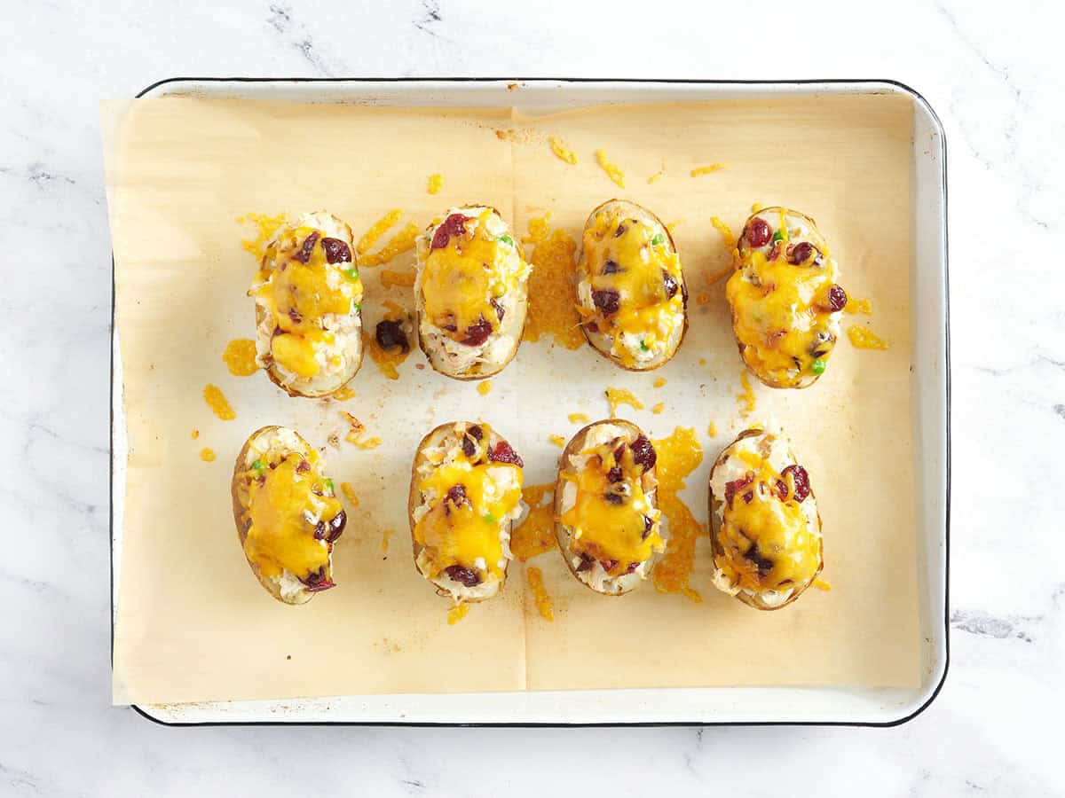 Finished thanksgiving leftover potato skins on a baking sheet.