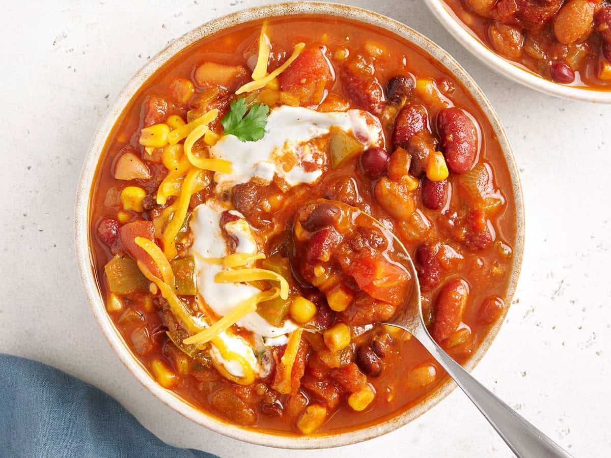 overhead view of vegetarian chili topped with all the fixings