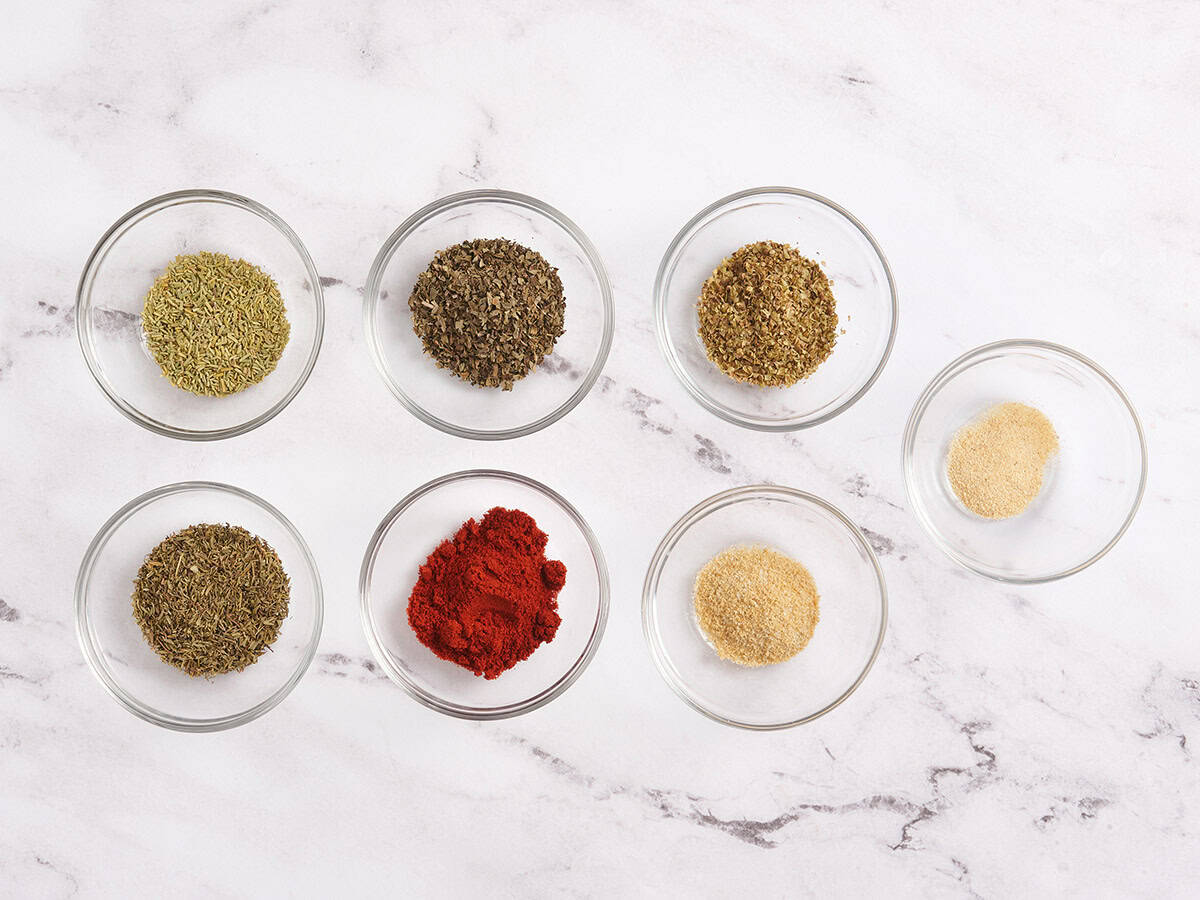 The ingredients to make homemade poultry seasoning.