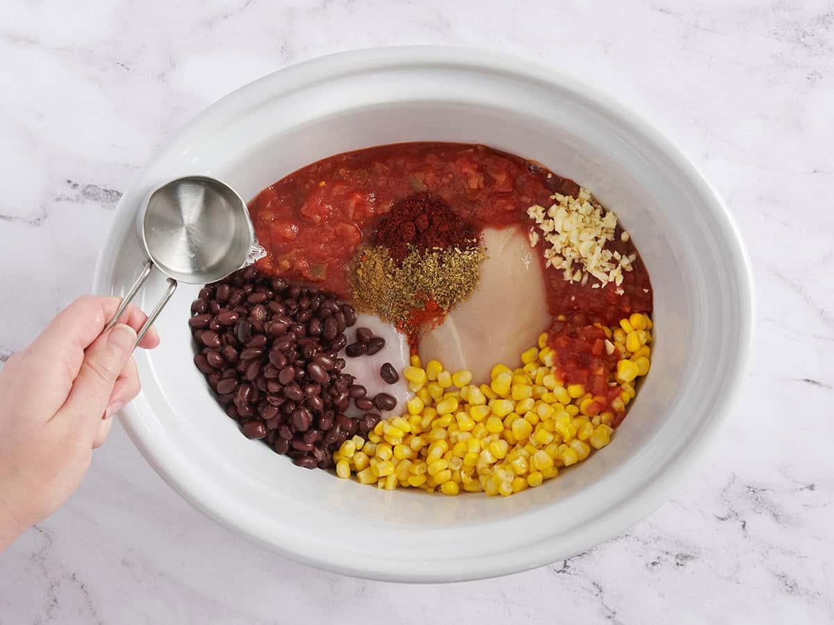 Ingredients for taco chicken bowls in the crockpot.