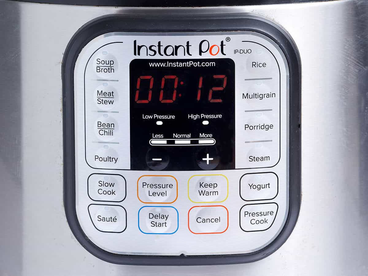 The timer on an instant pot set to 12 minutes.