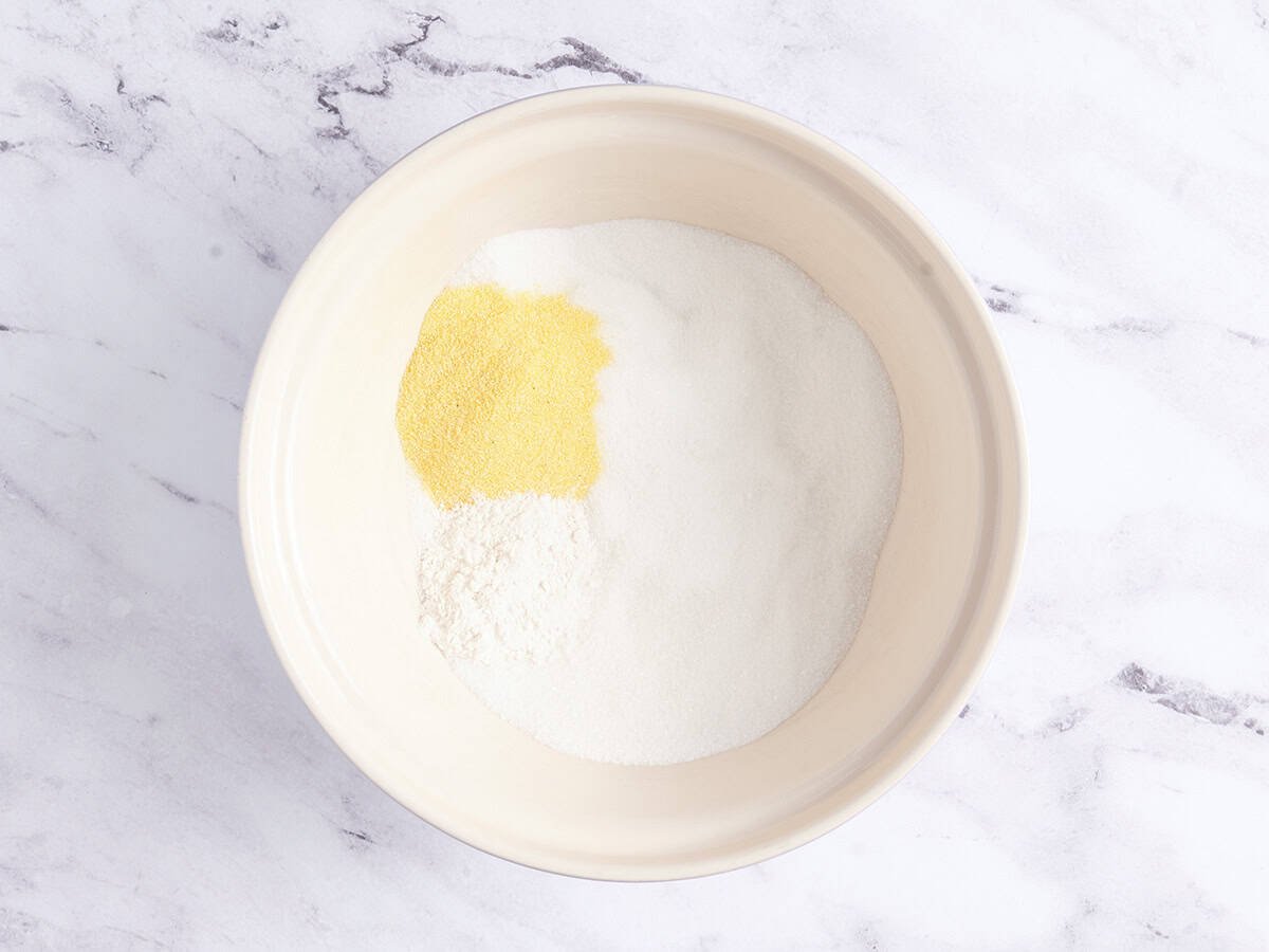 Flour and cornmeal in a bowl.