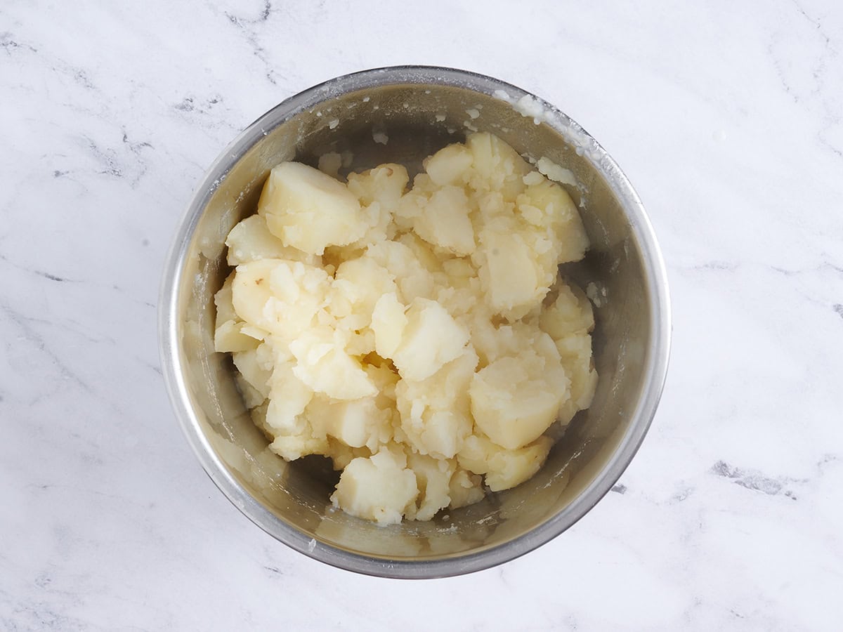 Drained cooked potatoes in an instant pot.