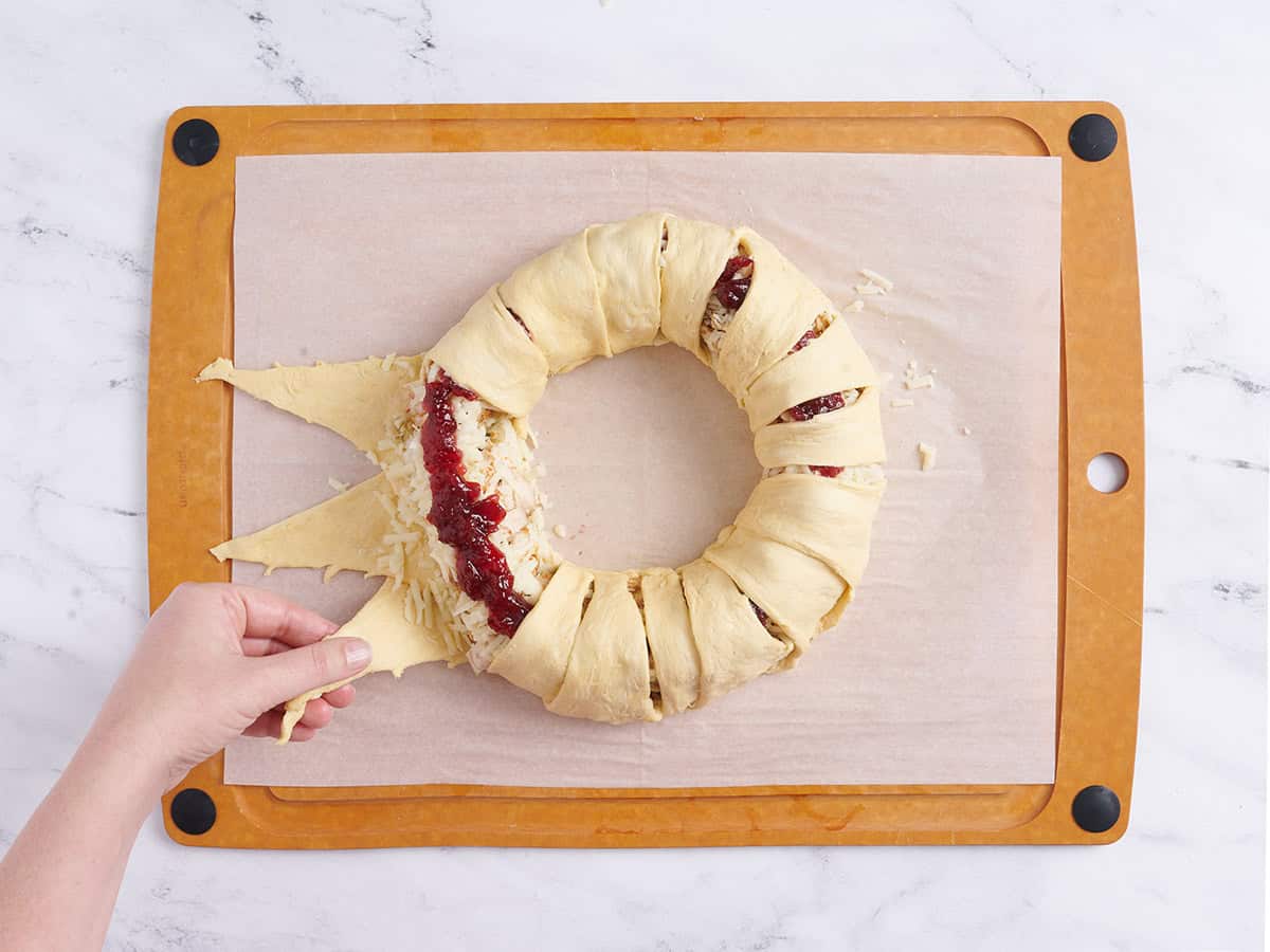 Folding over the dough.